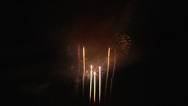 Extract from a huge fireworks display from a festival: Formation of colourful streaks