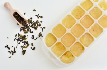 Green tea ice cubes, natural beauty product full of antioxidants, remedy for puffy eyes.