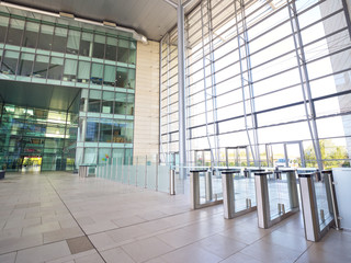 Interior View Of Modern Office Lobby With Security Check Barriers