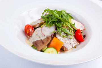 beef salad with greens and vegetables