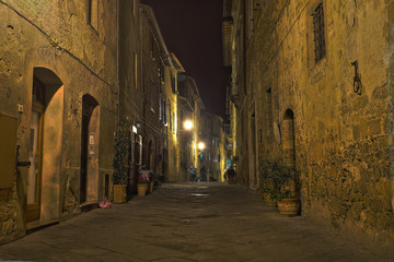 Obraz premium Beautiful Italian street of small old provincial town