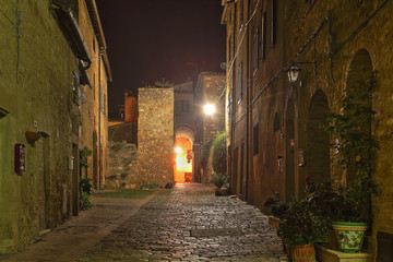 Fototapeta premium Beautiful Italian street of small old provincial town