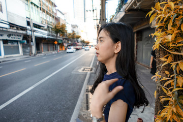 A woman crossing the road