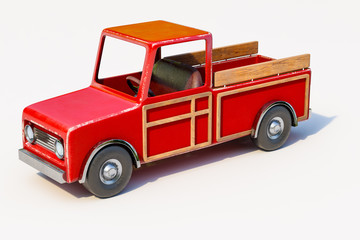 3d rendering of The red retro toy truck for Christmas holiday props, isolated on white background with clipping paths.