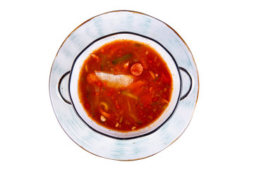 Rassolnik with sausage and sausage