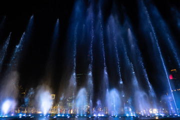 The colorful fountain on the lake at the Waterfront in the city