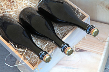 bottled wine stored in wooden boxes