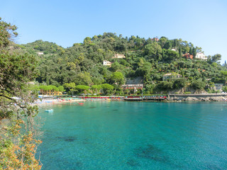 beach known as paraggi near portofino in genoa on a blue sky and sea background