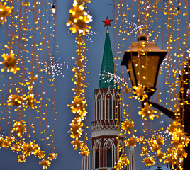 Christmas decorations on Nikolskaya Street in Moscow, Russia/ View of the Kremlin/ Selective focus