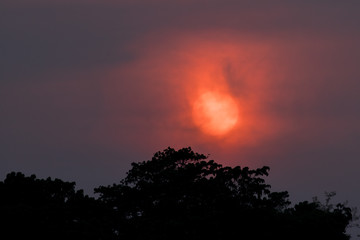 Fiery sun at sunset