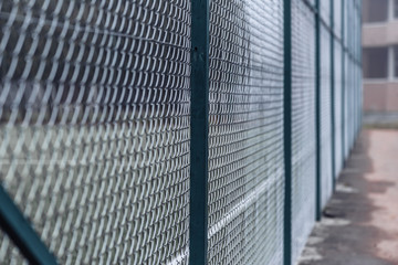 Mesh fence for sports and other areas