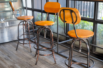 Wooden chairs in coffee shop