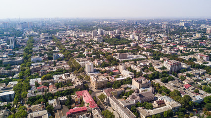 Fototapeta na wymiar Aerial view to Odessa, roofs, port and sea from above