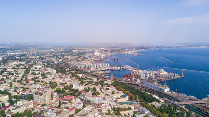 Fototapeta premium Aerial view to Odessa, roofs, port and sea from above