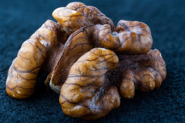 walnut on a black velvet background