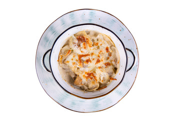 Fried dumplings under cream sauce