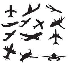 A set or icon collection of black planes drawings on a beige background.A group or collection of aircrafts ideal for grungy,travel,flight,transport,business or commercial designs isolated on white
