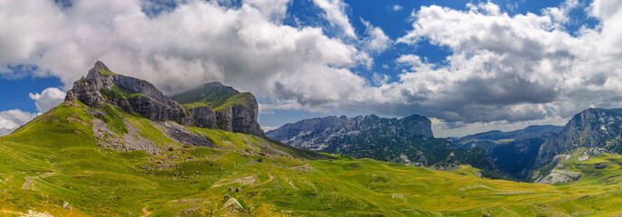 Summer mountaine panorama landscape with cloudy sky. Mountain scenery, National park Durmitor, Zabljak, Montenegro