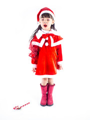 Asian girl is wearing a Santa costume to celebrate Christmas. White background