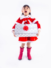 Asian girl is wearing a Santa costume to celebrate Christmas. White background