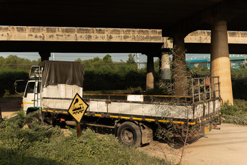 Truck parked by the side of the road