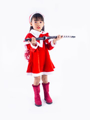 Asian girl is wearing a Santa costume to celebrate Christmas. White background