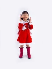 Asian girl is wearing a Santa costume to celebrate Christmas. White background