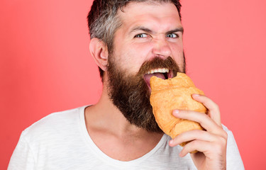 Delicious breakfast. Unhealthy but yummy breakfast. Perfect match. feel hunger. Bearded hipster enjoy breakfast. Morning tradition concept. Fresh baked croissant. hungry hipster bite croissant