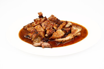Assorted delicious Grilled pork and spicy sauce on a white plate isolated on white background