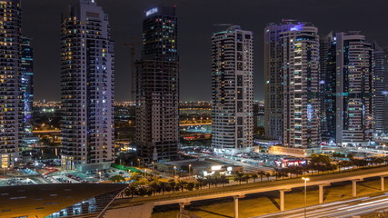 Fototapeta na wymiar Aerial top view to Sheikh Zayed road near Dubai Marina and JLT timelapse, Dubai.