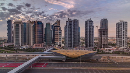 Aerial top view to Sheikh Zayed road during sunrise near Dubai Marina and JLT timelapse, Dubai.