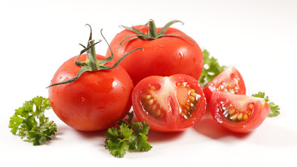 red tomato and herb isolated on white background