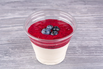 Dessert with blackcurrant and vanilla souffle