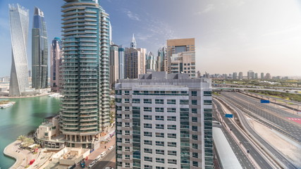 Naklejka premium Aerial top view to Sheikh Zayed road near Dubai Marina and JLT timelapse, Dubai.