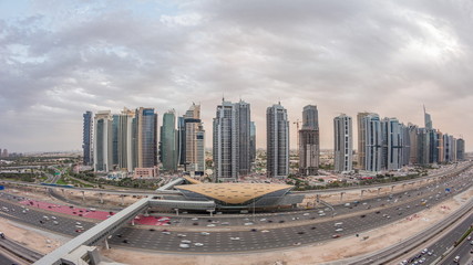 Aerial top view to Sheikh Zayed road near Dubai Marina and JLT day to night timelapse, Dubai.