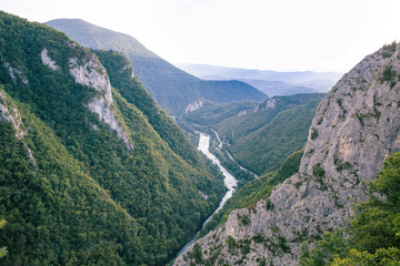 Naklejka premium The river at the bottom of the picturesque canyon.