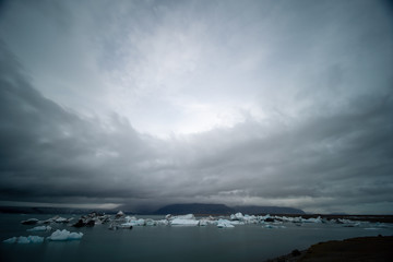 Fragments of iceberg in sea water. Iceland north sea