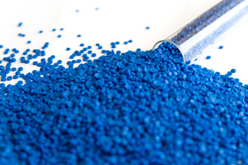 Close-up of plastic polymer granules. hand hold Polymer pellets. polymer plastic. compound polymer.
