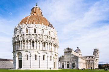 Fototapeta premium Pisa Italy: Square of Miracles with buildings of: the Baptistery represents birth, the Cathedral life and the Camposanto death. The Leaning Tower is a bell tower and the part of cathedral.