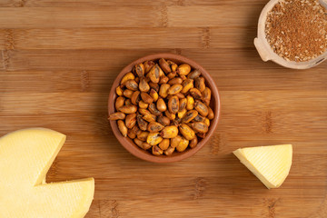 roasted corn, served with cheese and chili pepper. Typical dish of Ecuadorian cuisine called 