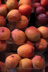 Fresh baby mangoes at a market