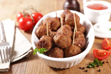 fried meatball with tomato sauce