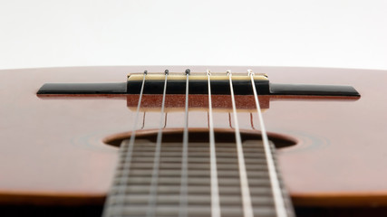fragment of classical guitar closeup. musical instrument