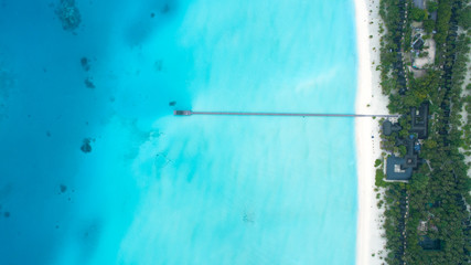 Beautiful aerial view of Maldives and tropical beach . Travel and vacation concept