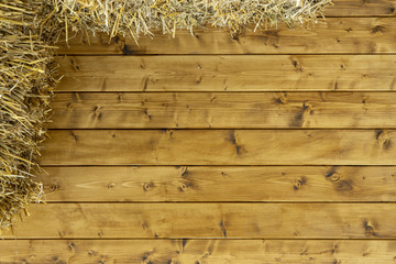 rural simple pattern wooden deck wall textured background surface and straw in corner frame, empty copy space for your text or inscription  © Artem Kniaz