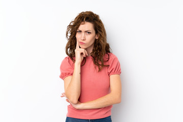 Young pretty woman over isolated background Looking front