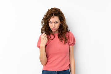 Young pretty woman over isolated background with angry gesture