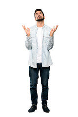 Fototapeta premium Full-length shot of Handsome man with beard frustrated by a bad situation over isolated white background