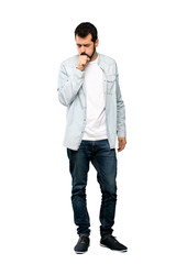 Naklejka premium Full-length shot of Handsome man with beard is suffering with cough and feeling bad over isolated white background