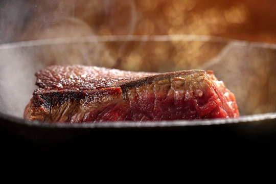 Beef steak fried in a pan
